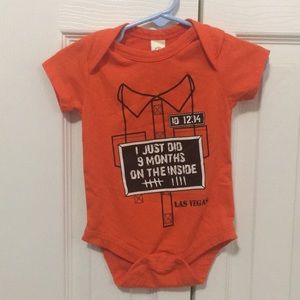 Orange short sleeve jumpsuit onesie